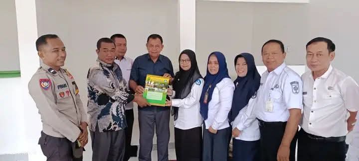 Kepala Desa Limau Manis Hadiri Penyerahan SK Kepala Sekolah di Gedung SMA Negeri 3 Kemuning