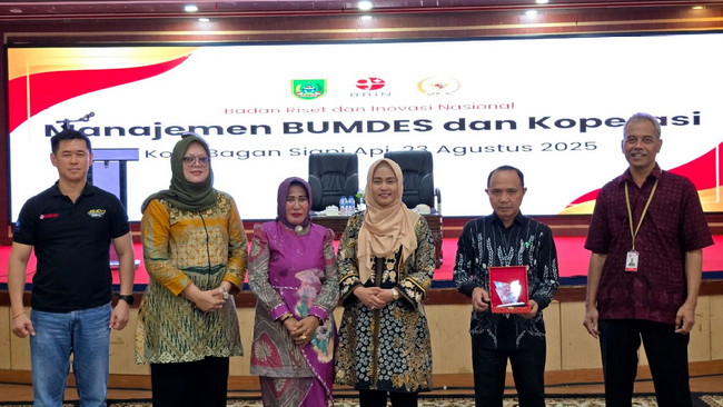 Lewat Seminar BRIN, Karmila Sari Ajak Masyarakat Rohil Berdayakan Koperasi Merah Putih untuk Kemajuan Desa