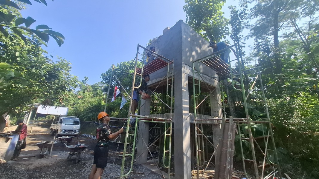 Tinggal Finishing, Pembangunan Tandon SPAM TMMD Ke-128 di Brabe Hampir Rampung