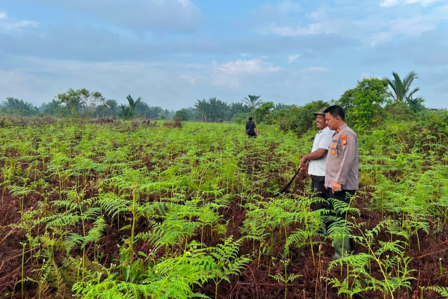 Polsek Mandah Koordinasi dengan Masyarakat Desa Bente Siapkan Lahan Penanaman Jagung