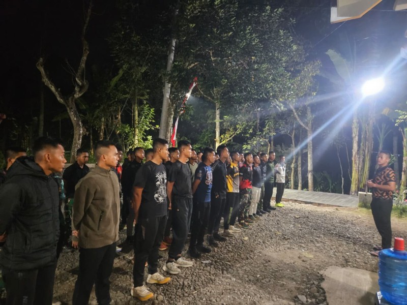 Satgas TMMD ke-129 Gelar Apel Malam, Pastikan Kesiapan Personel dan Kelancaran Pelaksanaan Tugas